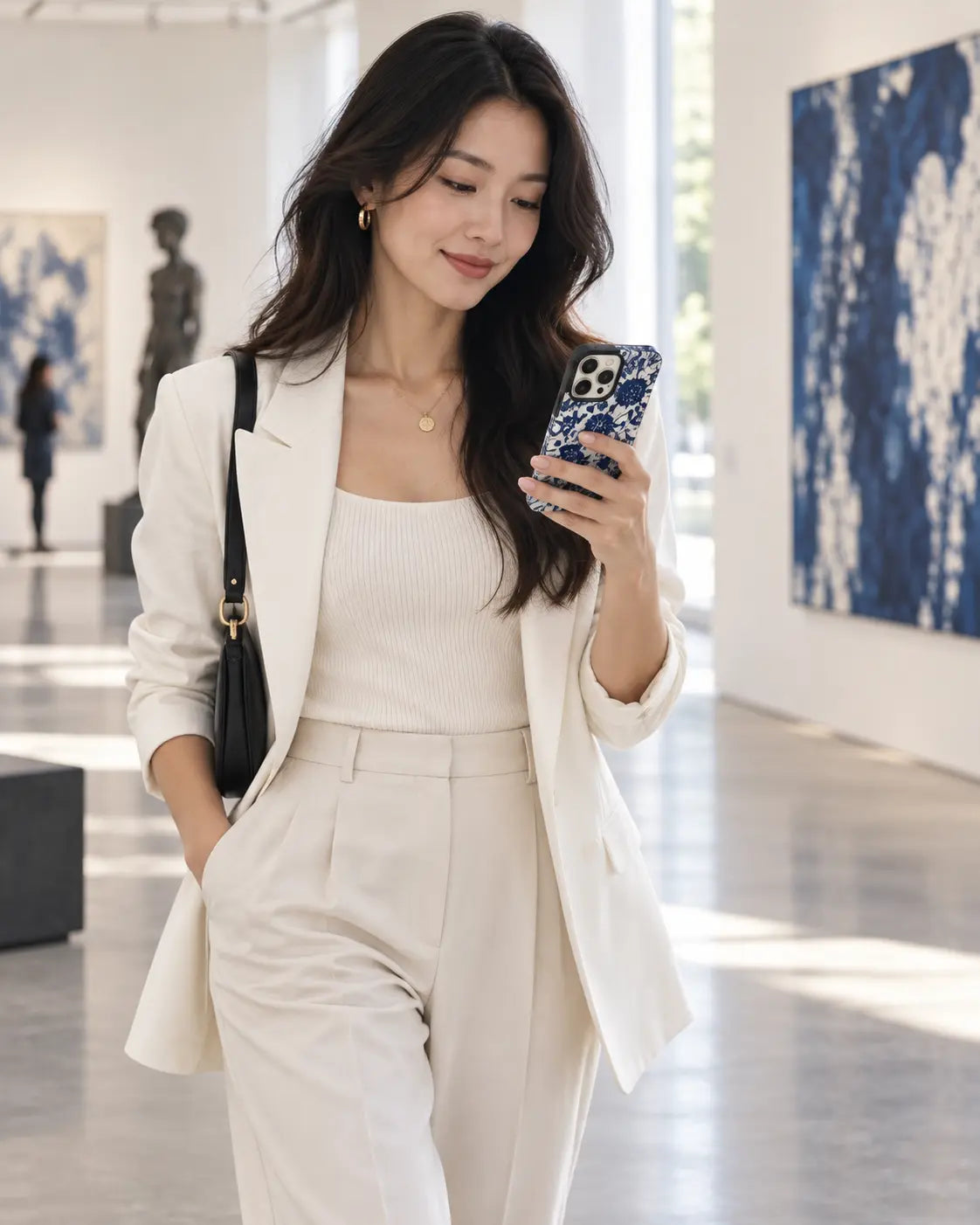 Woman in an art gallery using a Full-Wrap case with a cobalt botanical pattern