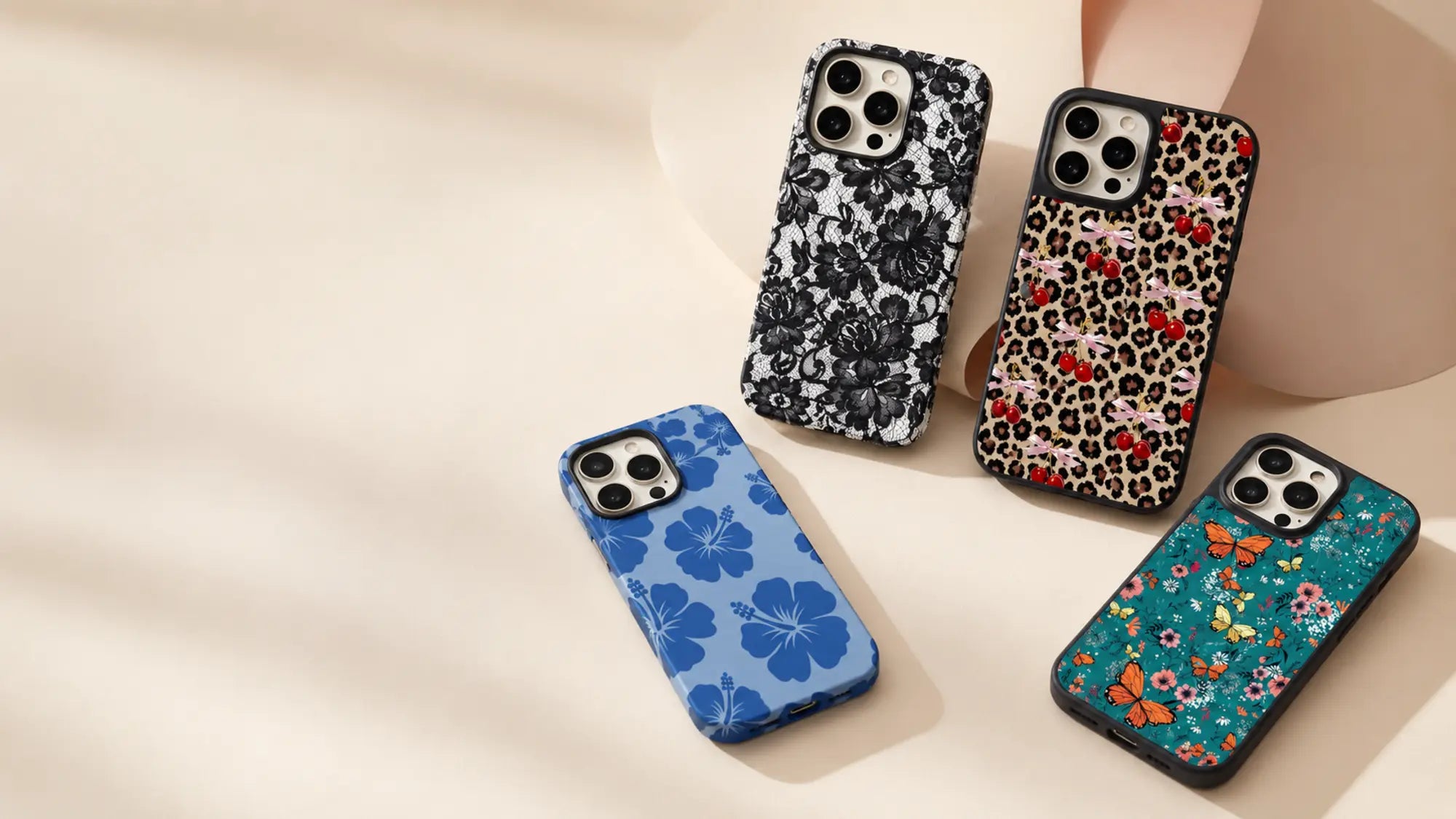 Four Ehreus cases in black lace, cherry leopard, blue hibiscus and butterfly garden designs